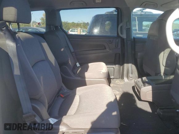 2018 Honda Odyssey LX with VIN 5FNRL6H22JB087152, listed as a Copart auction lot 76754974 with 73,057 mi miles and Salvage Title. Bid and sale history available at carsss.com. Image 11.