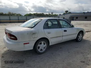 1995 Mitsubishi Galant ES with VIN 4A3AJ56G4SE193873, listed as a Copart auction lot 71312154 with 57,695 mi miles and Clean Title. Bid and sale history available at carsss.com. Image 3.