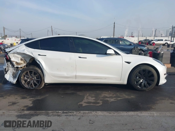 2021 Tesla Model 3 Long Range with VIN 5YJ3E1EB0MF009965, listed as a IAAI auction lot 41478233 with 31,713 mi miles and . Bid and sale history available at DreamBid. Image 13.