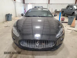 2012 Maserati GranTurismo Sport z VIN ZAM45MMA7C0062010, wystawiony jako Copart lot #59426994 z przebiegiem 49 936 mil mil oraz Szkoda całkowita • Salvage title. Historia ofert i sprzedaży dostępna na DreamBid. Obrazek 5.