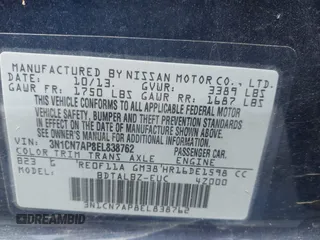 2014 Nissan Versa S with VIN 3N1CN7AP8EL838762, listed as a IAAI auction lot 42048678 with 90,867 mi miles. Bid and sale history available at carsss.com. Image 9.