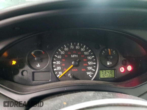 2000 Ford Focus SE with VIN 1FAFP3432YW312878, listed as a Copart auction lot 45812005 with 164,560 mi miles and Salvage Title. Bid and sale history available at carsss.com. Image 9.
