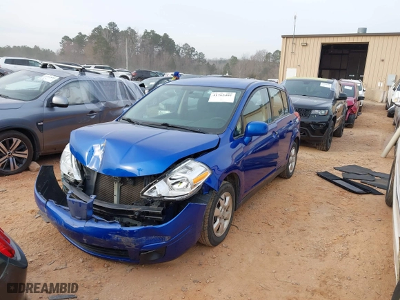 2012 Nissan Versa S with VIN 3N1BC1CP0CK239739, listed as a IAAI auction lot 41763481 with 146,605 mi miles. Bid and sale history available at carsss.com. Image 2.