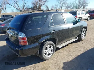 2004 Acura MDX Touring Pkg w/Navigation with VIN 2HNYD18804H525580, listed as a IAAI auction lot 41815839 with 281,295 mi miles. Bid and sale history available at carsss.com. Image 4.