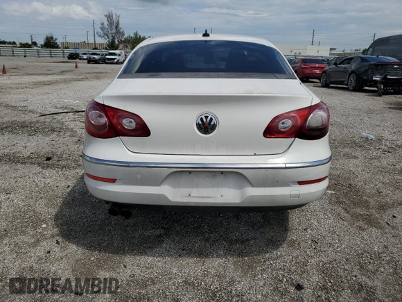 2010 Volkswagen CC Sport with VIN WVWML7AN0AE504872, listed as a Copart auction lot 71602244 with 89,089 mi miles and Salvage Title. Bid and sale history available at carsss.com. Image 6.