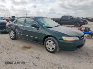 2000 Honda Accord EX с VIN 1HGCG1655YA090500, выставлен на аукционе Copart как лот 57306215 с пробегом 140 080 миль миль и Списание • Salvage title. История ставок и продаж доступна на DreamBid. Изображение 4.