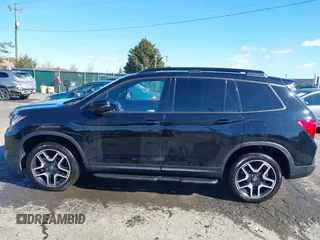 2023 Honda Passport Elite with VIN 5FNYF8H04PB006514, listed as a IAAI auction lot 41537826 with 14,640 mi miles and . Bid and sale history available at DreamBid. Image 15.