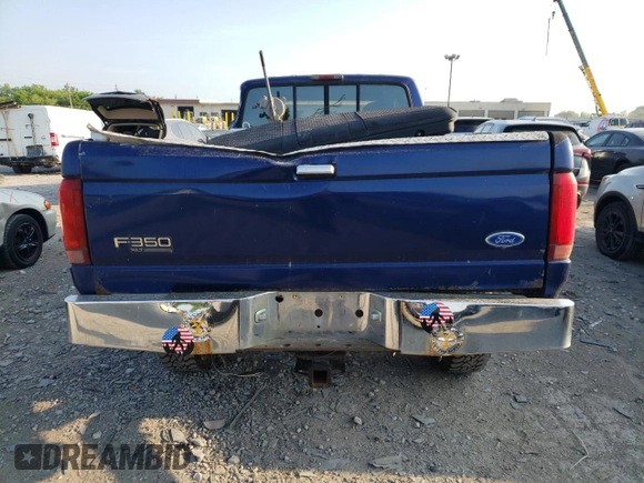 1997 Ford F-350 with VIN 1FTJW36F0VEC59307, listed as a Copart auction lot 62430515 with 199,894 mi miles and Salvage title. Bid and sale history available at DreamBid. Image 6.