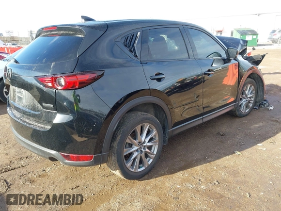 2021 Mazda CX-5 Grand Touring with VIN JM3KFBDM0M1357587, listed as a IAAI auction lot 41680245 with 1 mi miles. Bid and sale history available at carsss.com. Image 4.