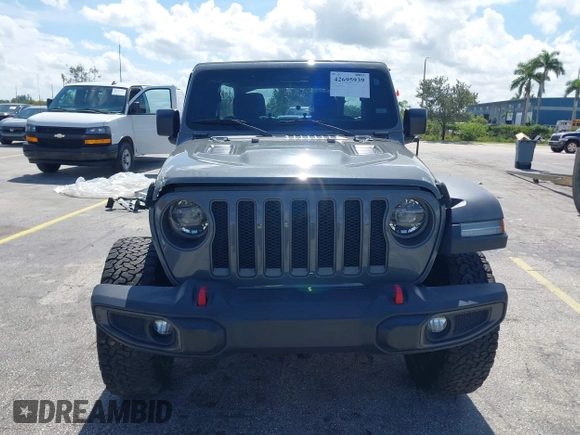 2019 Jeep Wrangler Unlimited Rubicon with VIN 1C4HJXFN9KW507281, listed as a IAAI auction lot 42695939 with 60,802 mi miles and . Bid and sale history available at DreamBid. Image 13.