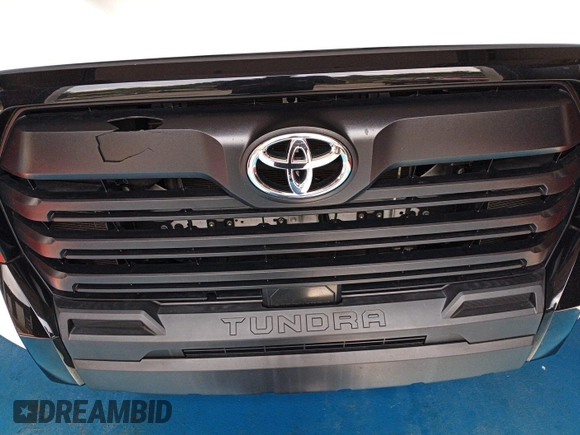 2022 Toyota Tundra SR with VIN 5TFKB5DAXNX006096, listed as a IAAI auction lot 42727998 with 44,389 mi miles and . Bid and sale history available at DreamBid. Image 17.