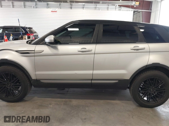 2014 Land Rover Range Rover Evoque Pure Plus with VIN SALVP2BG4EH860959, listed as a IAAI auction lot 42249173 with 111,283 mi miles and . Bid and sale history available at DreamBid. Image 14.