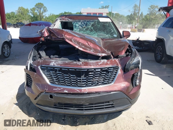 2022 Cadillac XT4 FWD Luxury with VIN 1GYAZAR42NF162880, listed as a IAAI auction lot 41850951 with 47,344 mi miles and . Bid and sale history available at carsss.com. Image 6.