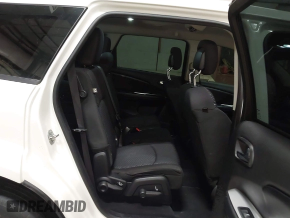 2015 Dodge Journey American Value z VIN 3C4PDCAB4FT714200, wystawiony jako IAAI lot #42199910 z przebiegiem 205 009 mil mil oraz . Historia ofert i sprzedaży dostępna na DreamBid. Obrazek 8.