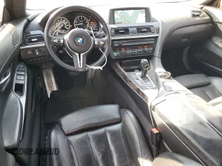 2013 BMW 6 Series 650i with VIN WBA6B2C59DDG66909, listed as a Copart auction lot 86329014 with 131,054 mi miles and Salvage Title. Bid and sale history available at DreamBid. Image 8.