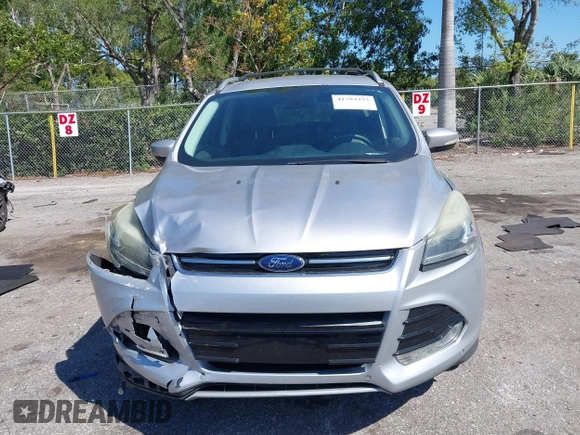 2016 Ford Escape Titanium with VIN 1FMCU0JX2GUC39416, listed as a IAAI auction lot 41793375 with 146,877 mi miles. Bid and sale history available at carsss.com. Image 12.