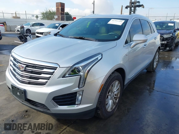 2017 Cadillac XT5 FWD with VIN 1GYKNARS7HZ144148, listed as a IAAI auction lot 41392399 with 96,252 mi miles and . Bid and sale history available at carsss.com. Image 2.