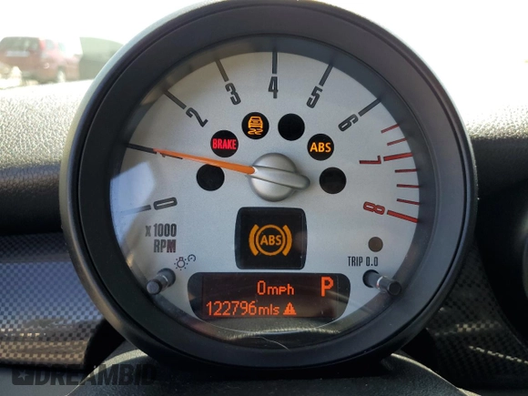 2012 MINI Hardtop S with VIN WMWSV3C57CTY16657, listed as a Copart auction lot 62812445 with 122,796 mi miles and Salvage title. Bid and sale history available at DreamBid. Image 9.