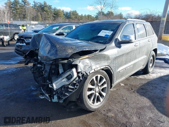 2017 Jeep Grand Cherokee Overland with VIN 1C4RJFCG8HC835645, listed as a IAAI auction lot 41442765 with 95,324 mi miles and . Bid and sale history available at DreamBid. Image 2.