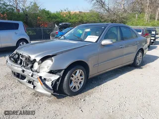 2003 Mercedes-Benz E-Class 3.2L with VIN WDBUF65J93X099223, listed as a IAAI auction lot 42033473 with 230,758 mi miles. Bid and sale history available at carsss.com. Image 2.