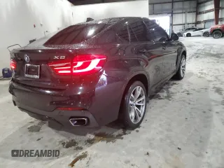 2015 BMW X6 sDrive35i with VIN 5UXKU0C50F0F91753, listed as a Copart auction lot 66999252 with 72,060 mi miles. Bid and sale history available at carsss.com. Image 4.