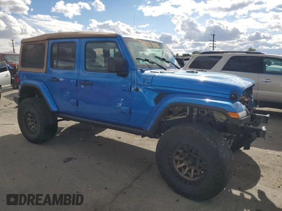 2021 Jeep Wrangler Unlimited Sahara High Altitude with VIN 1C4HJXEM3MW770622, listed as a Copart auction lot 76144874 with 71,886 mi miles and Salvage title. Bid and sale history available at DreamBid. Image 4.