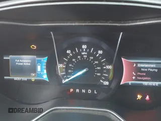 2016 Ford Fusion Titanium Hybrid with VIN 3FA6P0RU9GR143203, listed as a IAAI auction lot 41332144 with 94,357 mi miles. Bid and sale history available at carsss.com. Image 7.