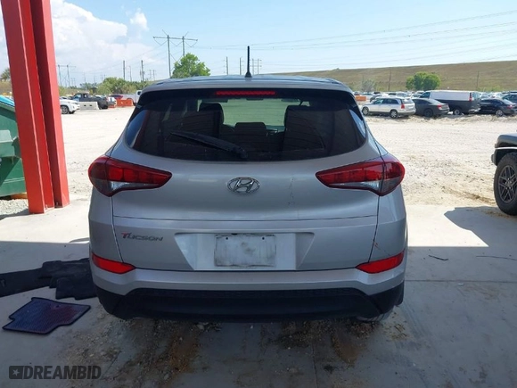 2018 Hyundai Tucson SE with VIN KM8J23A48JU646278, listed as a IAAI auction lot 41941577 with 115,228 mi miles. Bid and sale history available at carsss.com. Image 16.