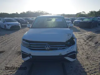 2022 Volkswagen Tiguan S z VIN 3VV1B7AX0NM126321, wystawiony jako IAAI lot #41939646 z przebiegiem 62 309 mil mil oraz . Historia ofert i sprzedaży dostępna na DreamBid. Obrazek 12.