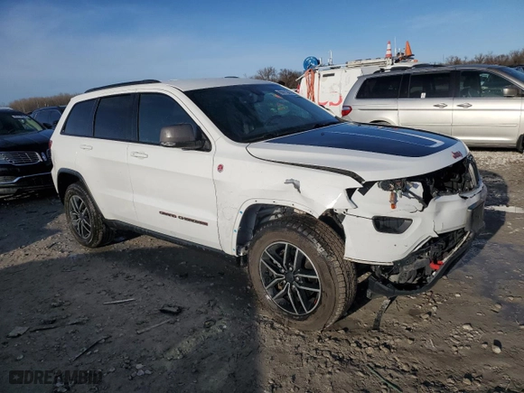 2019 Jeep Grand Cherokee Trailhawk with VIN 1C4RJFLG2KC692683, listed as a Copart auction lot 85011344 with 103,769 mi miles and Salvage Title. Bid and sale history available at carsss.com. Image 4.