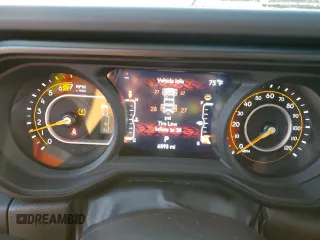 2024 Jeep Wrangler Sahara with VIN 1C4PJXENXRW118401, listed as a Copart auction lot 84731534 with 6,895 mi miles and Salvage Title. Bid and sale history available at DreamBid. Image 9.