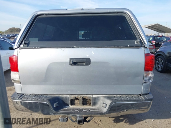 2013 Toyota Tundra z VIN 5TFRM5F17DX063683, wystawiony jako IAAI lot #41603196 z przebiegiem Nie podano mil oraz . Historia ofert i sprzedaży dostępna na DreamBid. Obrazek 16.