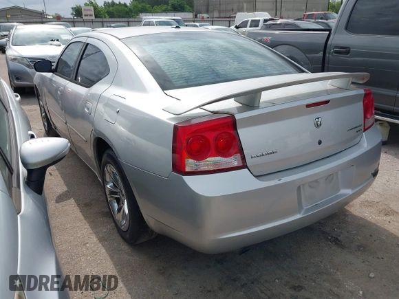 2010 Dodge Charger SXT with VIN 2B3CA3CV7AH292957, listed as a IAAI auction lot 42130665 with 253,598 mi miles and . Bid and sale history available at DreamBid. Image 3.