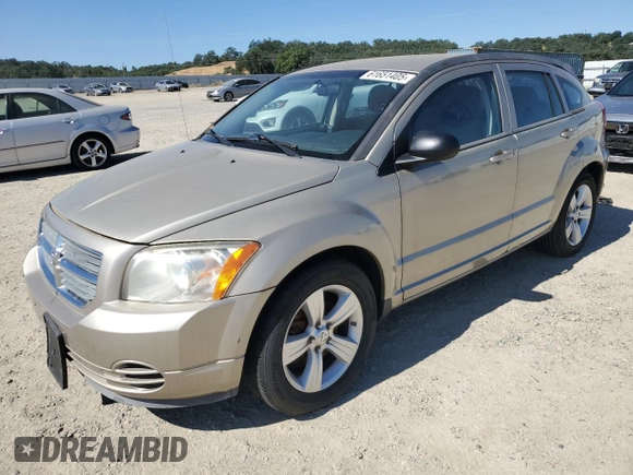 2010 Dodge Caliber SXT z VIN 1B3CB4HA7AD571525, wystawiony jako Copart lot #61651405 z przebiegiem 188 383 mil mil oraz Czysty tytuł • Clean title. Historia ofert i sprzedaży dostępna na DreamBid. Obrazek 1.