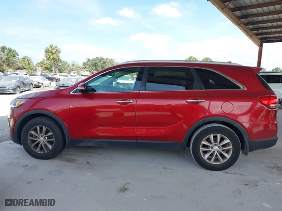 2016 Kia Sorento LX with VIN 5XYPG4A39GG090599, listed as a IAAI auction lot 42096430 with 126,595 mi miles. Bid and sale history available at carsss.com. Image 14.