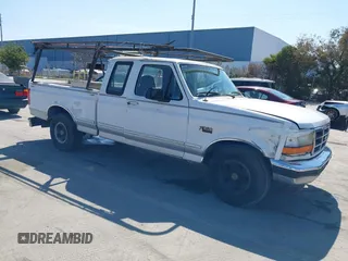 1996 Ford F-150 Special with VIN 1FTEX15N0TKA27266, listed as a IAAI auction lot 41857755 with 325,014 mi miles. Bid and sale history available at carsss.com. Image 1.