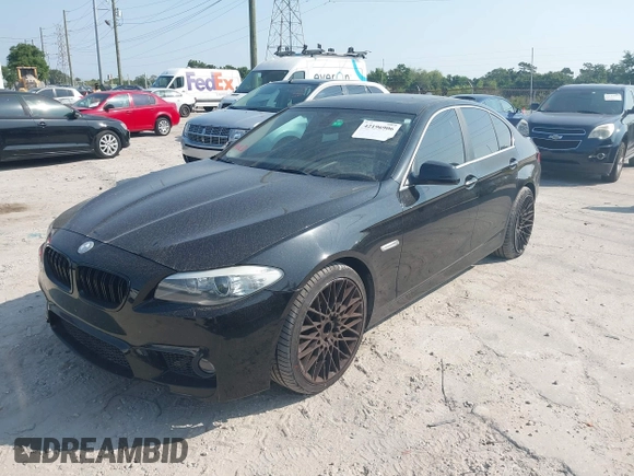 2012 BMW 5 Series 528i with VIN WBAXG5C58CDX05153, listed as a IAAI auction lot 42196906 with 120,652 mi miles. Bid and sale history available at carsss.com. Image 2.