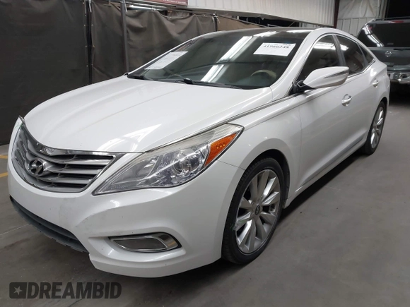 2013 Hyundai Azera with VIN KMHFH4JG1DA330604, listed as a IAAI auction lot 41966248 with 126,554 mi miles. Bid and sale history available at carsss.com. Image 2.