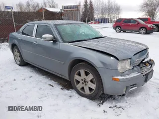 2006 Chrysler 300 C with VIN 2C3KK63H66H382504, listed as a IAAI auction lot 40599570 with 161,754 mi miles. Bid and sale history available at carsss.com. Image 1.
