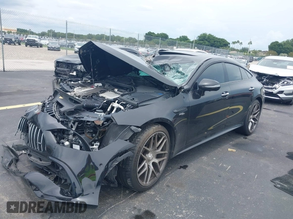 2022 Mercedes-Benz AMG GT 53 z VIN W1K7X6BB6NA045124, wystawiony jako IAAI lot #42637008 z przebiegiem Nie podano mil oraz . Historia ofert i sprzedaży dostępna na DreamBid. Obrazek 17.