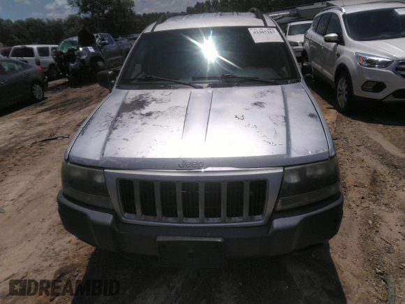 2004 Jeep Grand Cherokee Laredo z VIN 1J4GW48SX4C309998, wystawiony jako IAAI lot #42307167 z przebiegiem 306 912 mil mil oraz . Historia ofert i sprzedaży dostępna na DreamBid. Obrazek 12.