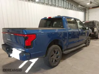 2022 Ford F-150 Lightning Pro with VIN 1FTVW1EL7NWG15923, listed as a IAAI auction lot 41396120 with 25,322 mi miles. Bid and sale history available at carsss.com. Image 4.