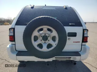 2000 Isuzu Rodeo S with VIN 4S2DM58WXY4302769, listed as a Copart auction lot 70416054 with 150,621 mi miles and Salvage Title. Bid and sale history available at DreamBid. Image 6.