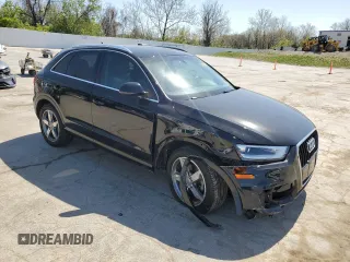 2015 Audi Q3 Premium Plus with VIN WA1BFCFS1FR004865, listed as a Copart auction lot 53348405 with 130,521 mi miles and Salvage title. Bid and sale history available at DreamBid. Image 4.