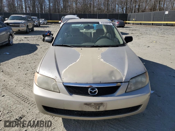 2002 Mazda Protege DX with VIN JM1BJ225520525472, listed as a Copart auction lot 45699915 with 183,457 mi miles and Salvage Title. Bid and sale history available at DreamBid. Image 5.