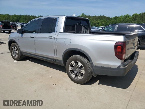 2019 Honda Ridgeline RTL-T with VIN 5FPYK3F67KB031672, listed as a Copart auction lot 55080205 with 106,912 mi miles and Salvage title. Bid and sale history available at DreamBid. Image 2.