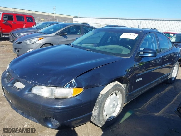 2003 Pontiac Grand Prix GT with VIN 1G2WP52K63F142683, listed as a IAAI auction lot 41774316 with 217905 miles. Bid and sale history available at carsss.com. Image 2.
