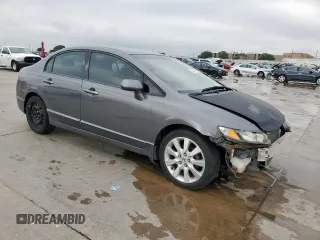 2010 Honda Civic LX with VIN 2HGFA1F52AH315977, listed as a Copart auction lot 54240115 with 217,883 mi miles and Salvage Title. Bid and sale history available at DreamBid. Image 4.