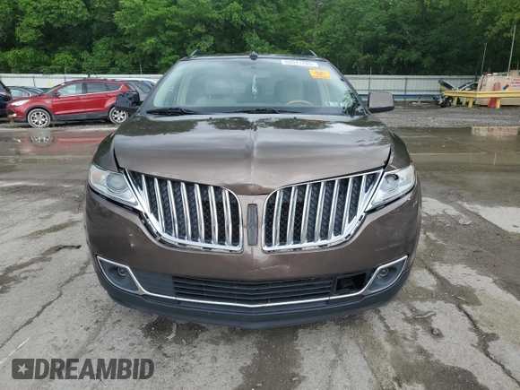 2011 Lincoln MKX z VIN 2LMDJ6JK5BBJ06463, wystawiony jako Copart lot #60041285 z przebiegiem 195 915 mil mil oraz Szkoda całkowita • Salvage title. Historia ofert i sprzedaży dostępna na DreamBid. Obrazek 5.