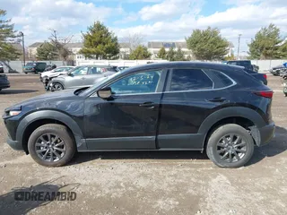 2022 Mazda CX-30 S with VIN 3MVDMBALXNM402265, listed as a IAAI auction lot 41458605 with 76,291 mi miles and . Bid and sale history available at carsss.com. Image 14.